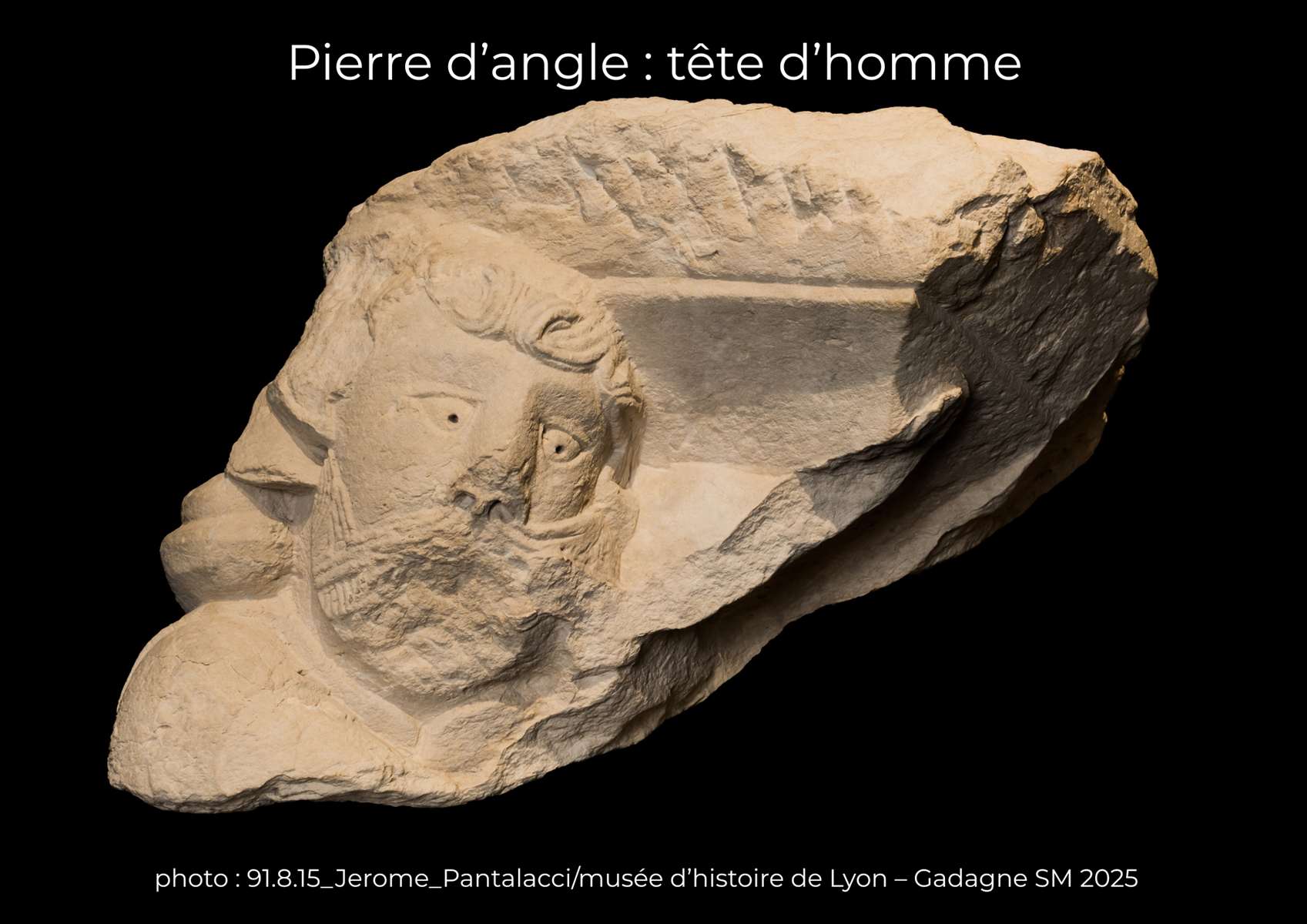 Pierre d’angle tête d’homme 91.8.15